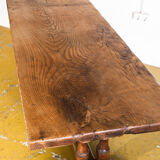Old coffee table in solid oak wood. France, early twentieth century.