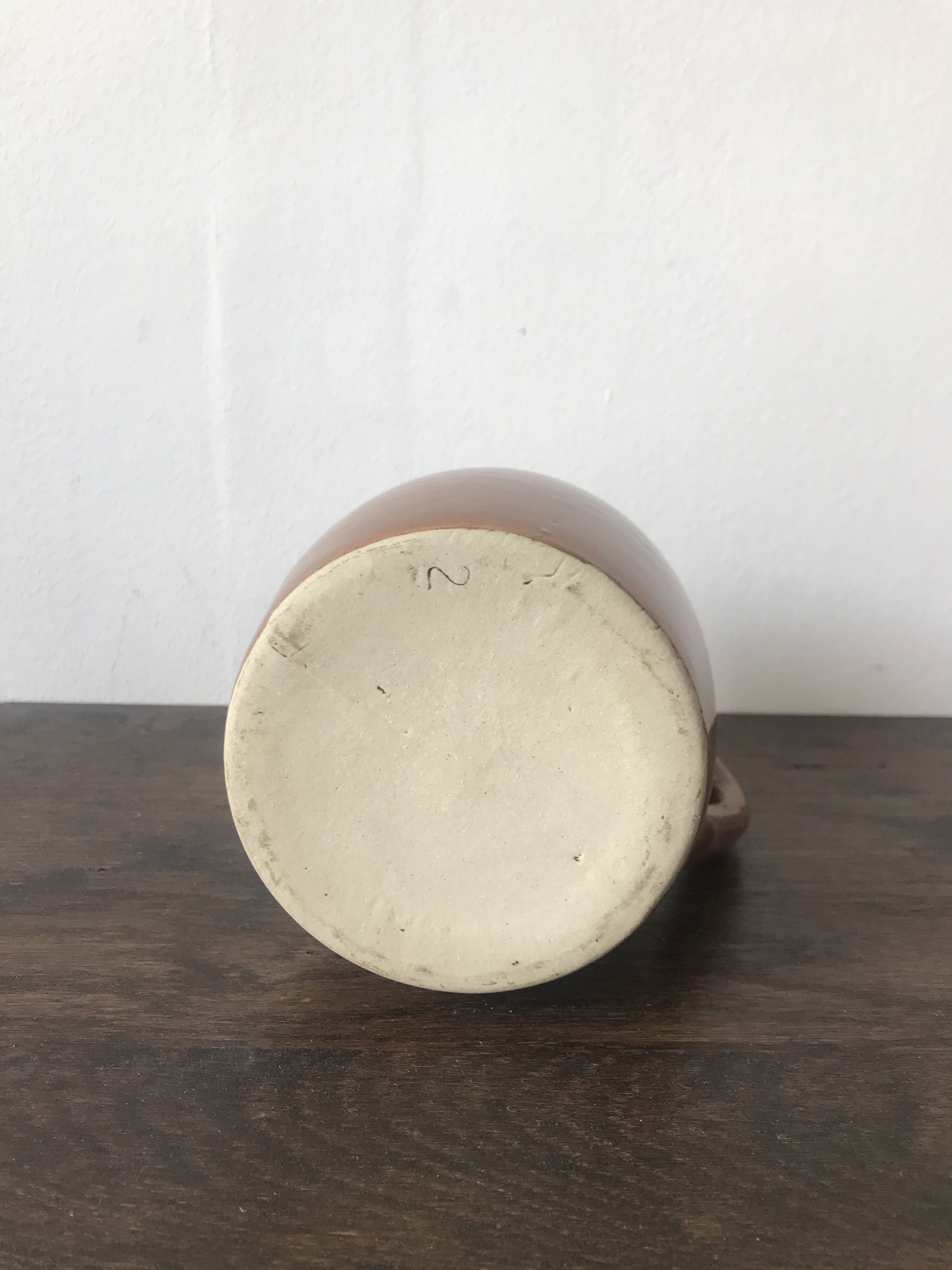 Set of 3 glazed stoneware jugs