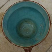 Old earthenware cachepot with woman decoration