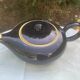 Teapot and milk jug We Two in vintage black and yellow ceramic