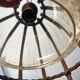 Vintage rattan pendant lamp with glass shade and cord accent