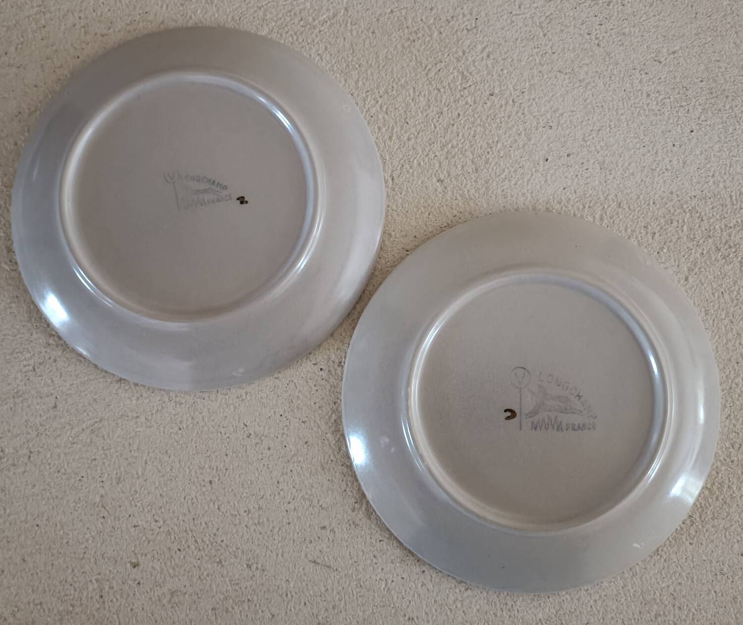 2 Longchamp dessert plates