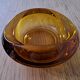 Amber glass ashtray or empty pocket