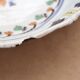 Shallow flat dish in Nevers faience from the 18th century.
