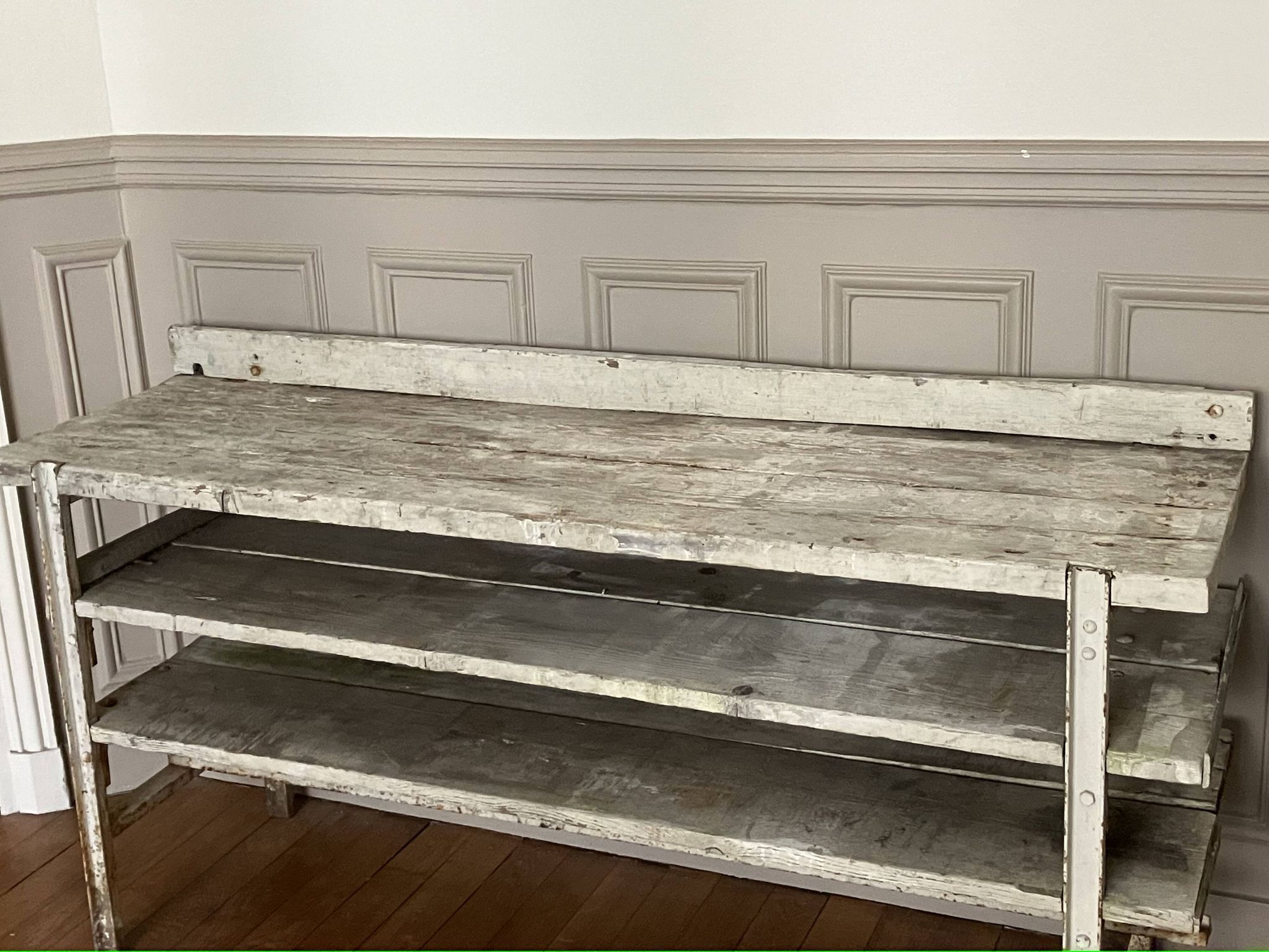 Old workbench, a piece of wooden and metal furniture.