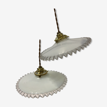 Pair of white opaline suspensions with serrated edges