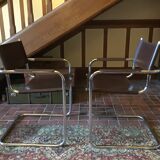 Leather and steel armchairs