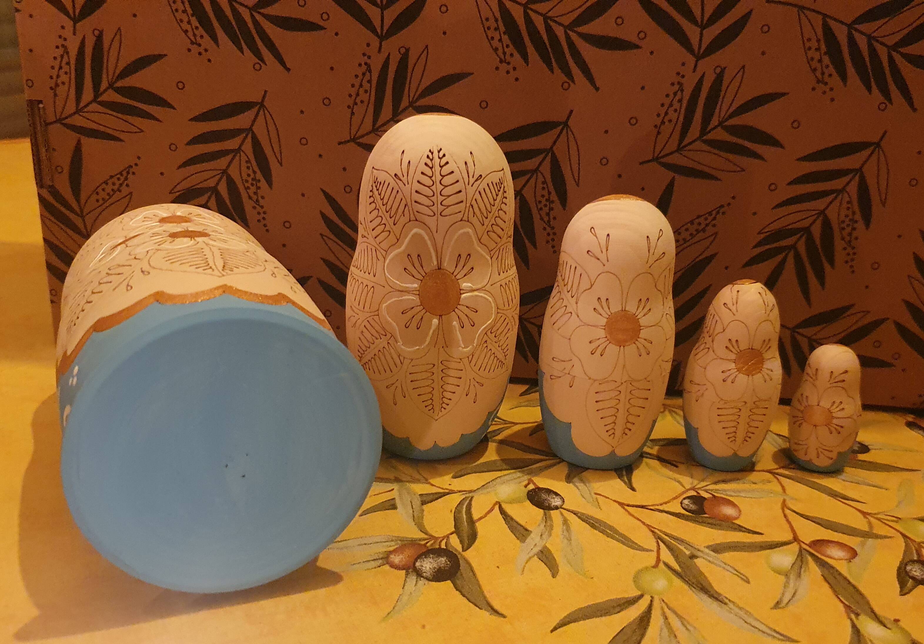 Matryoshka pyrography dolls