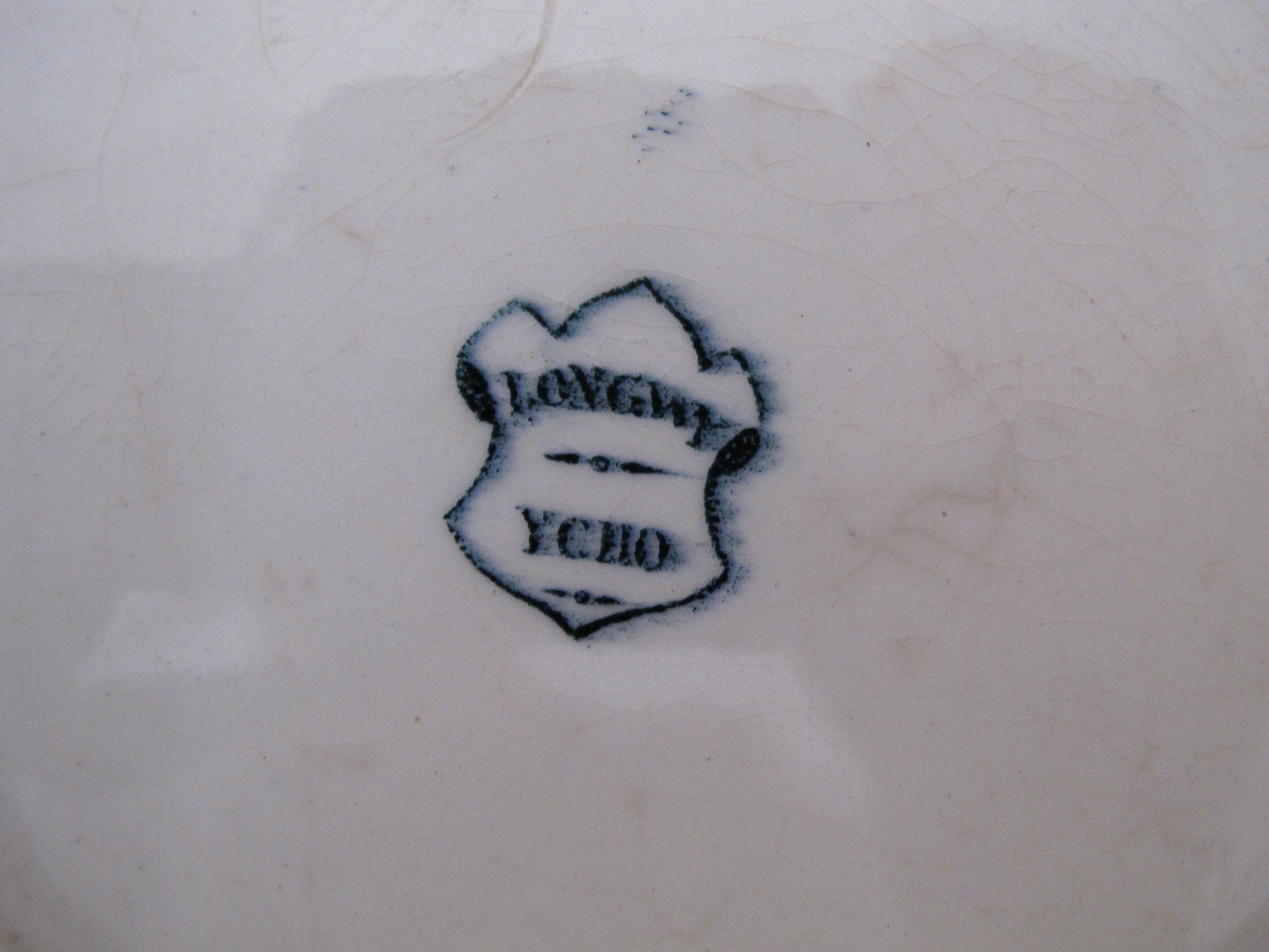 4 dessert plates in iron earth from Longwy