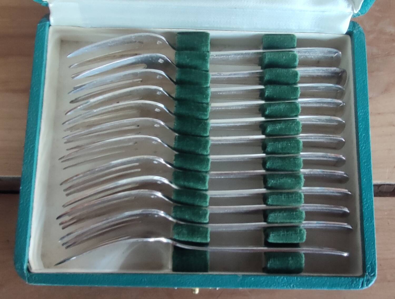 12 old silver-plated oyster forks