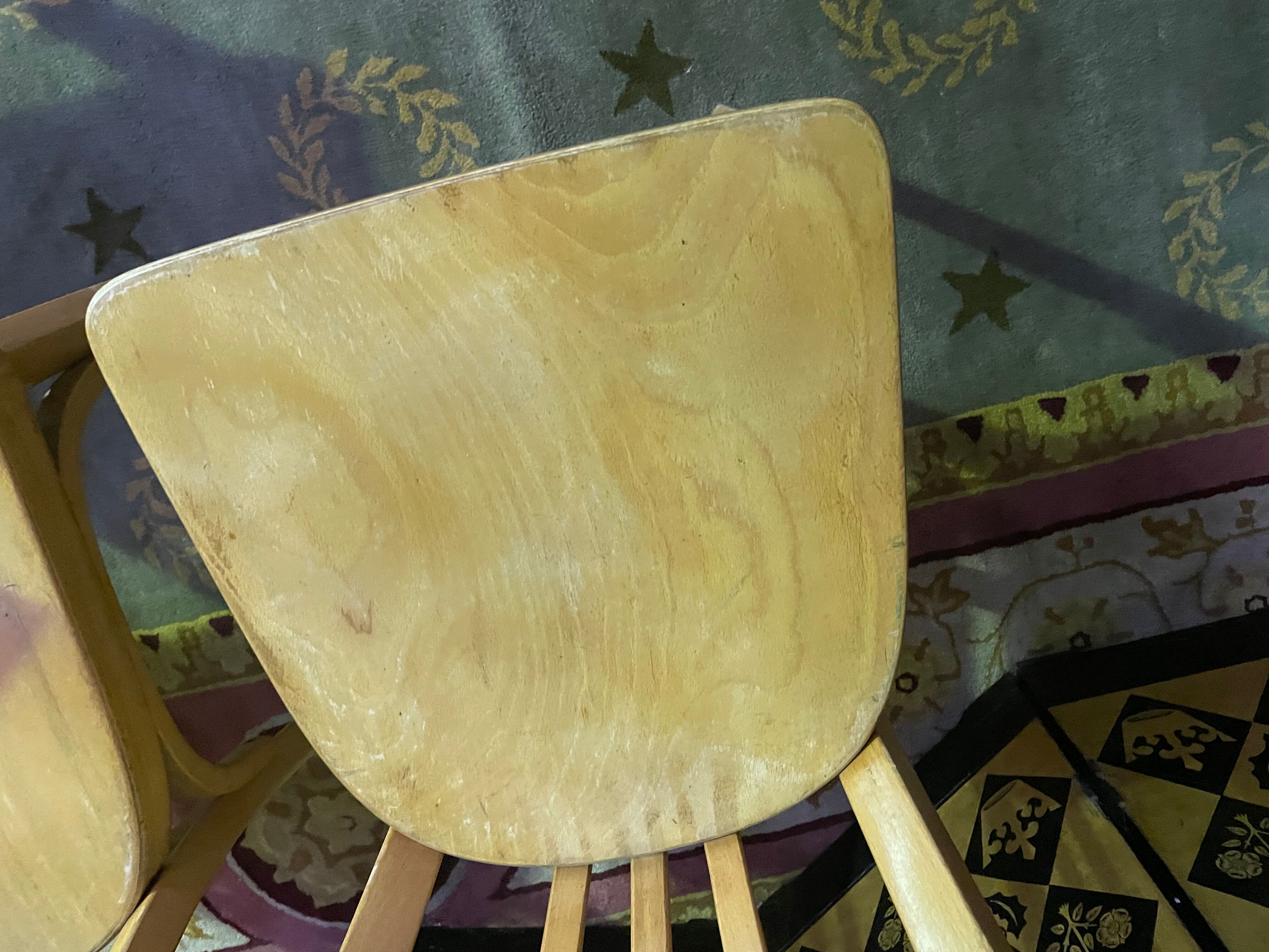 Suite of 6 bistro chairs signed "baumann"