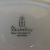 Flat oval signed Partridge winterling