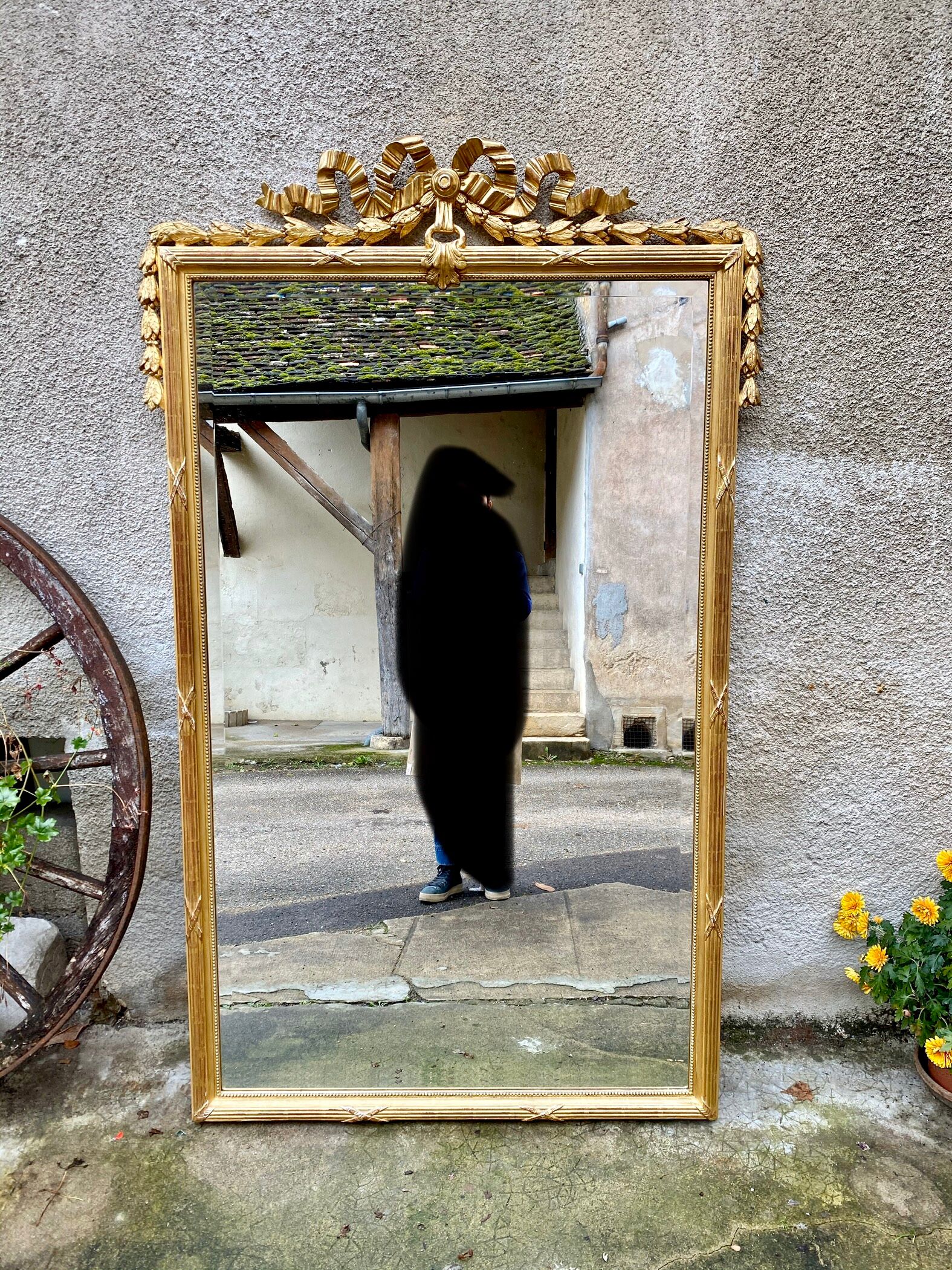 Louis XVI style mirror in gilded wood 176x109cm