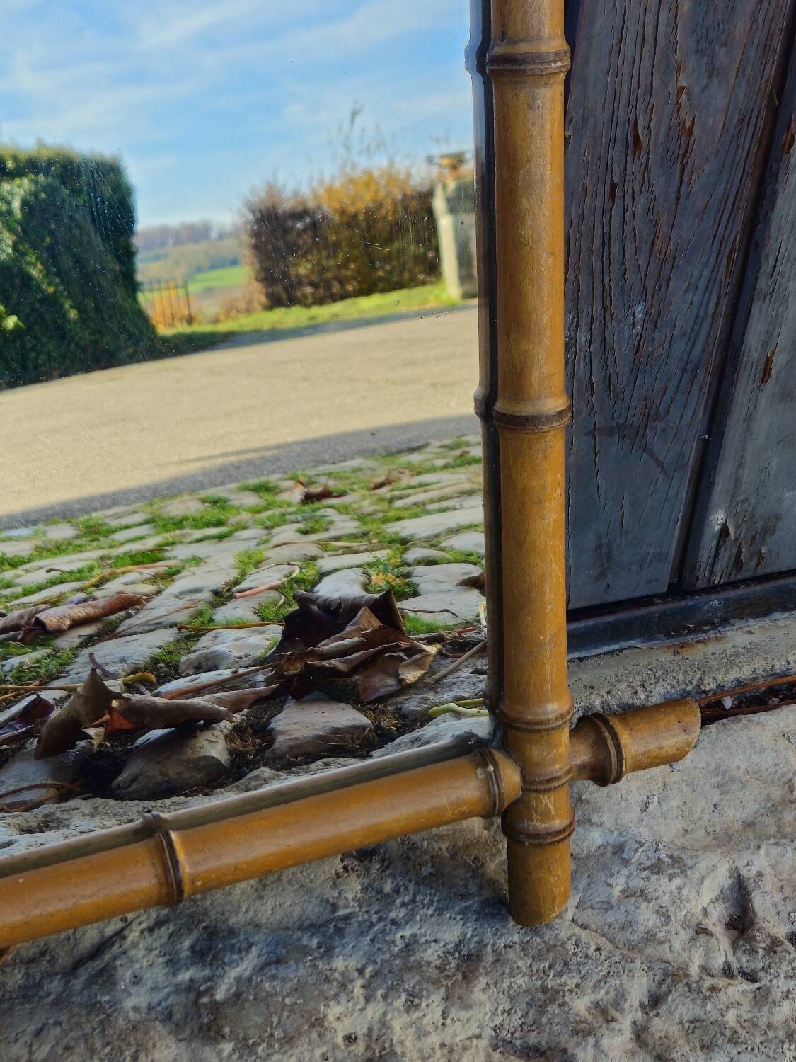 Turned wooden mirror, circa 1900