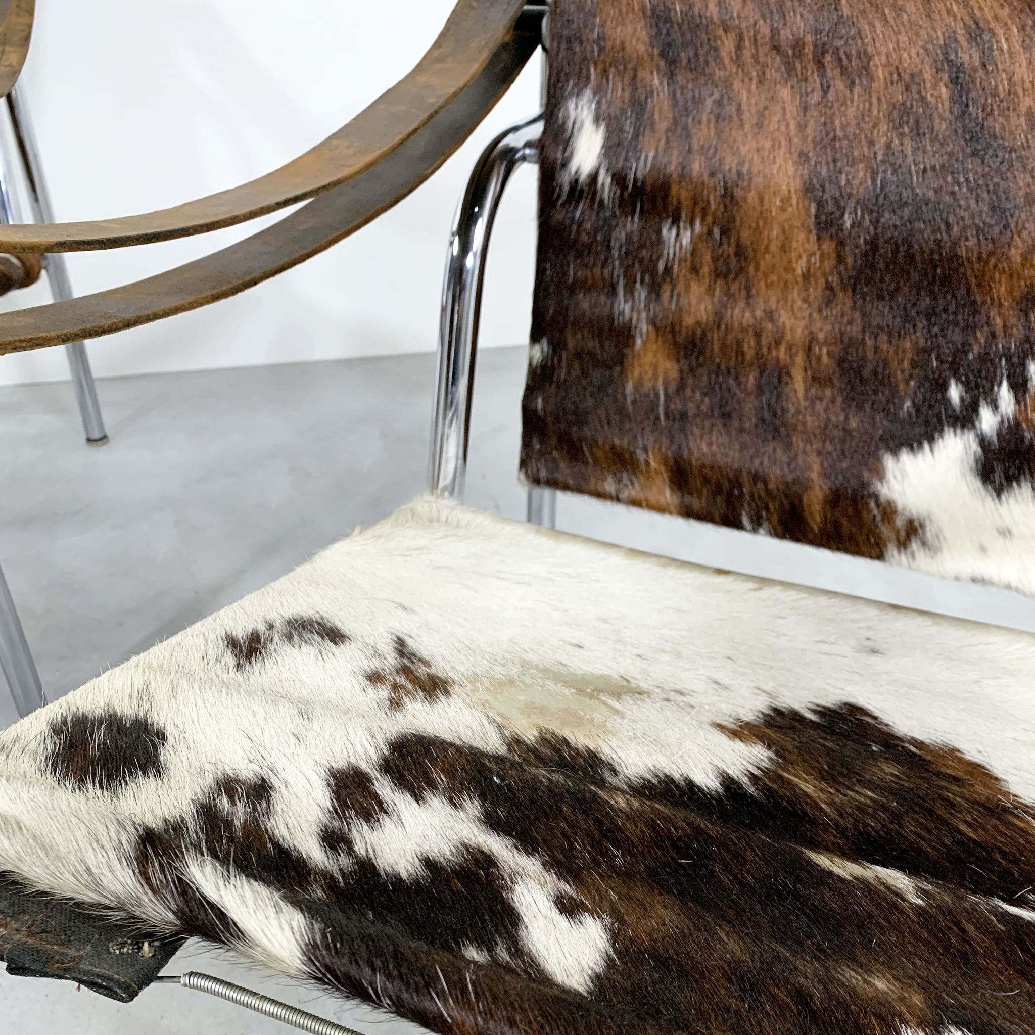 Pair of LC1 cow skin chairs by Le Corbusier for Cassina 1970