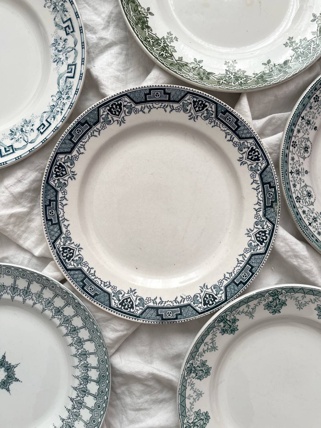 6 mismatched Saint Amand ironstone flat plates