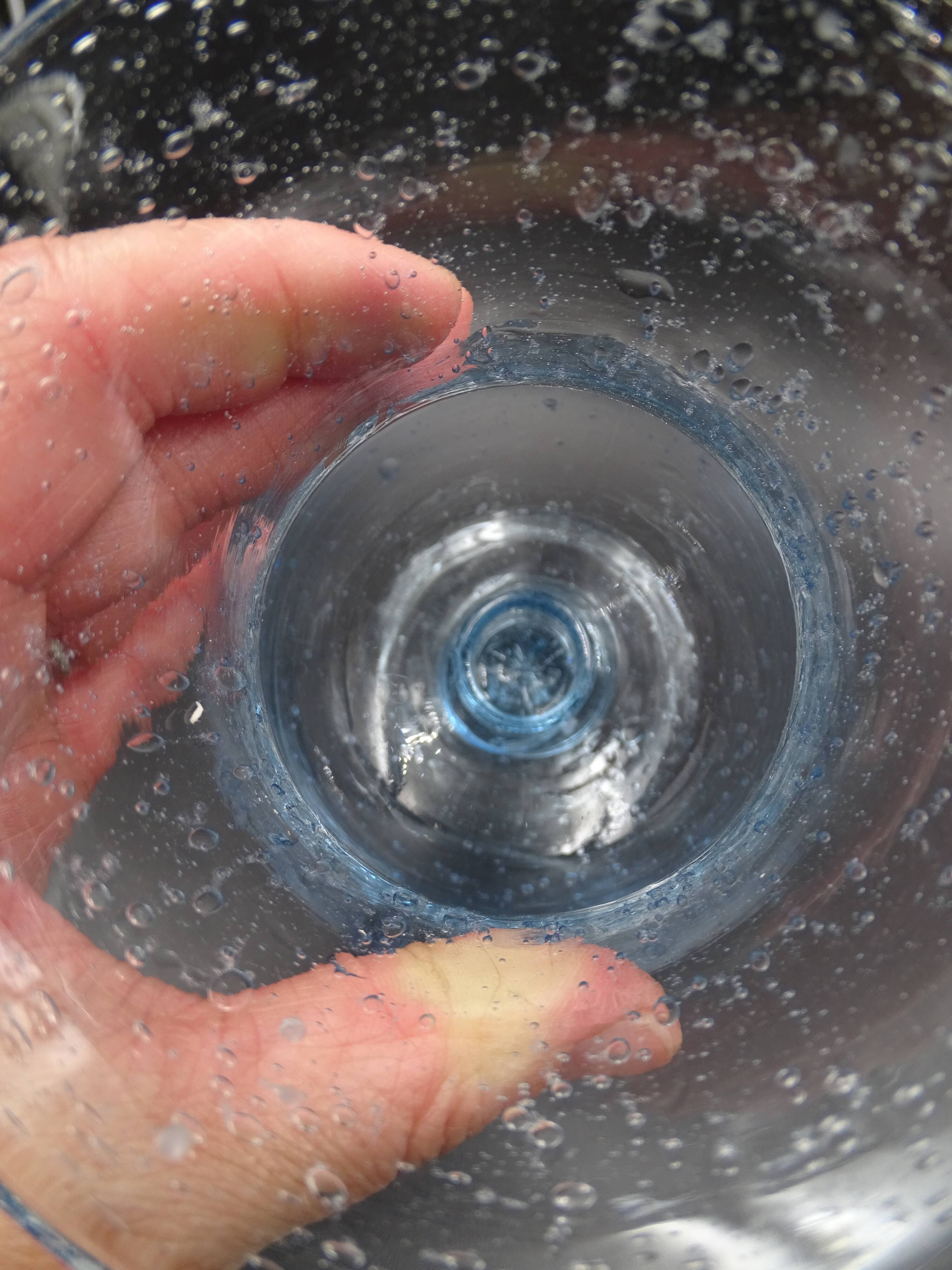 Candlestick or photophore in sky blue bulled glass, signed Biot