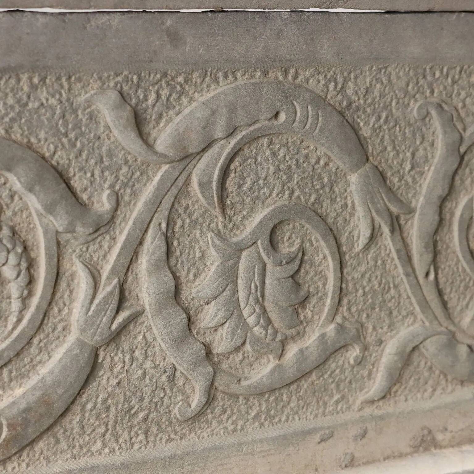 Ancient Renaissance fireplace lintel in pietra serena stone, 15th century.