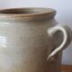 Eared beige sandstone pot