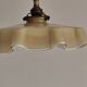 Electrified suspension with a frosted opaque glass disc shade.