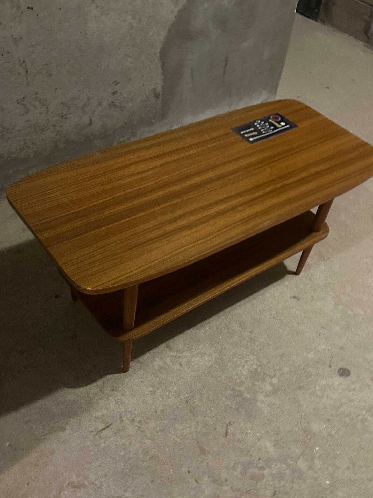 Scandinavian coffee table in teak and ceramic from the 1960s.