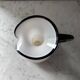 Single flower vase in white and black opaline