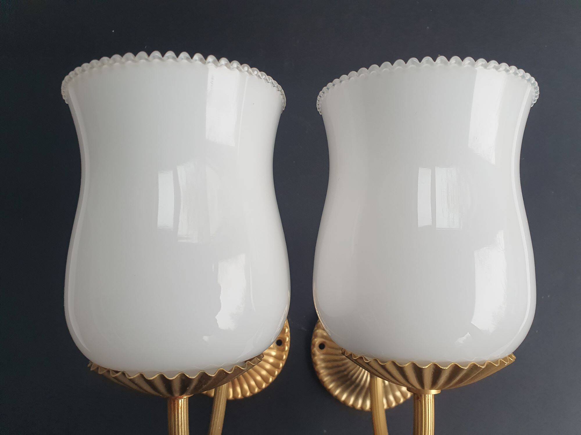 Pair of vintage gold-tone wall sconces with opaline glass globes