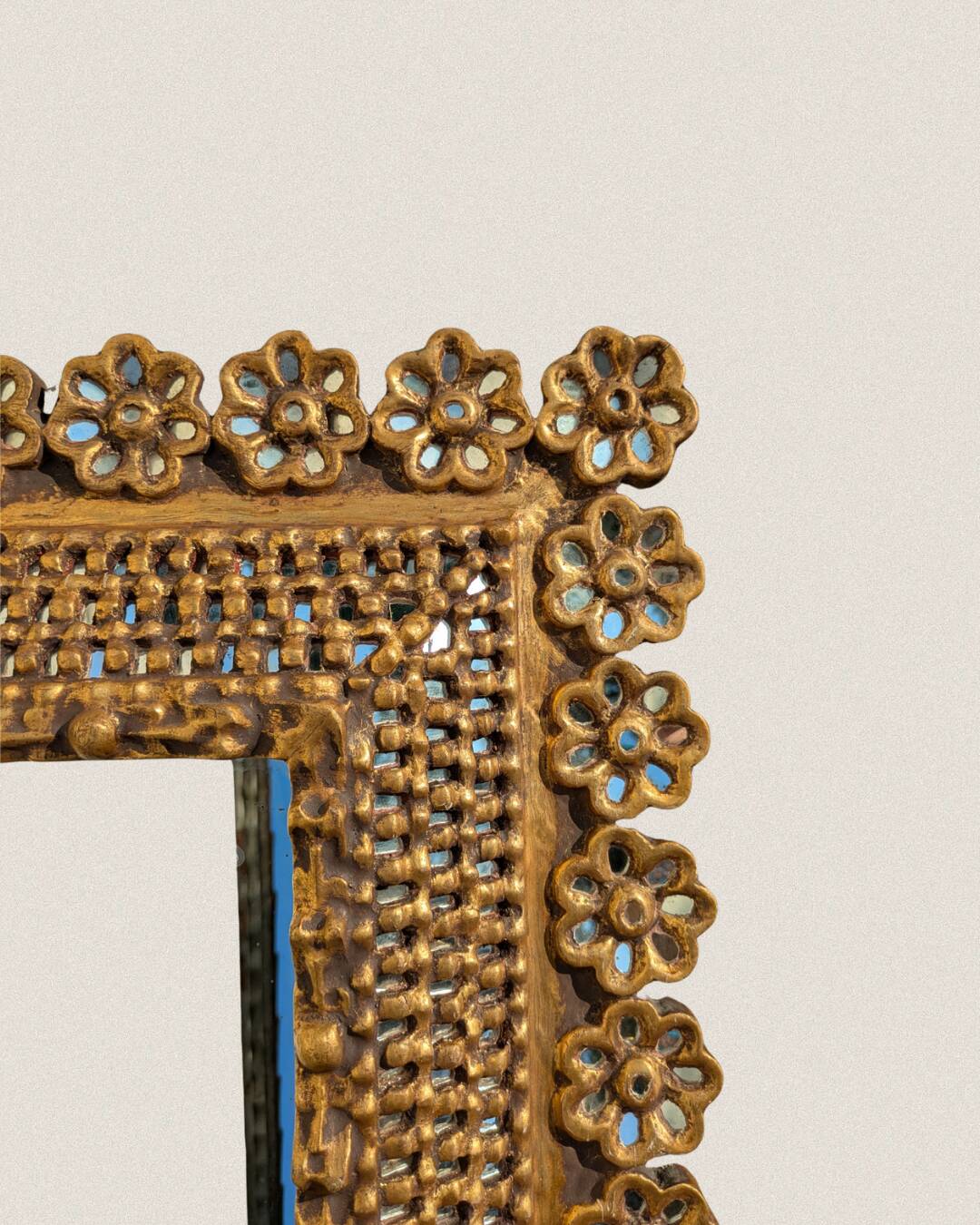 Antique mirror in gilded wood