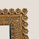Antique mirror in gilded wood