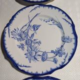 6 flat plates with floral decoration, T. de fer.