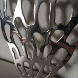 silver-plated metal strawberry-shaped trivet