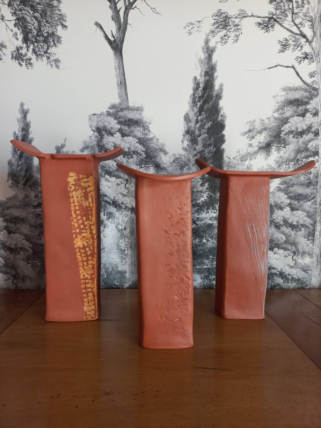 Trio of terracotta vases, unique pieces