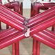 Red bamboo table by Arturo Pozzoli, 1980s, set of 7