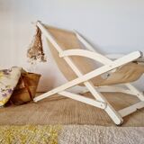 Old white wood deck chair Triconfort