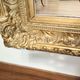 Mirror with large molded frame in gilded plaster with gold leaf