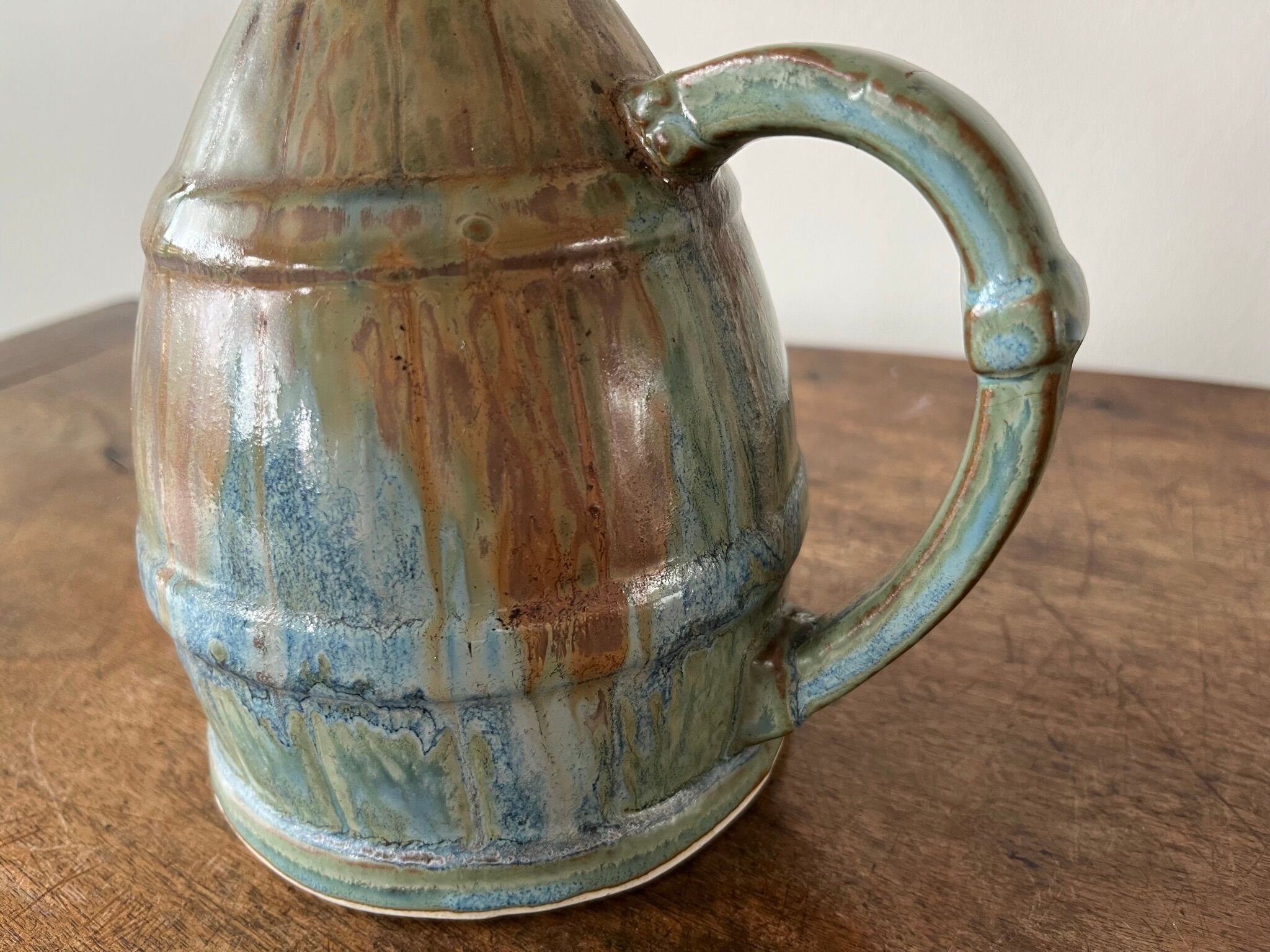 Pitcher in flamed sandstone