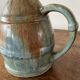 Pitcher in flamed sandstone