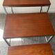 Trio of teak and chrome metal nesting tables from the 60s-70s