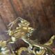 Paire d'appliques avec ampoules en bronze doré style Louis XV