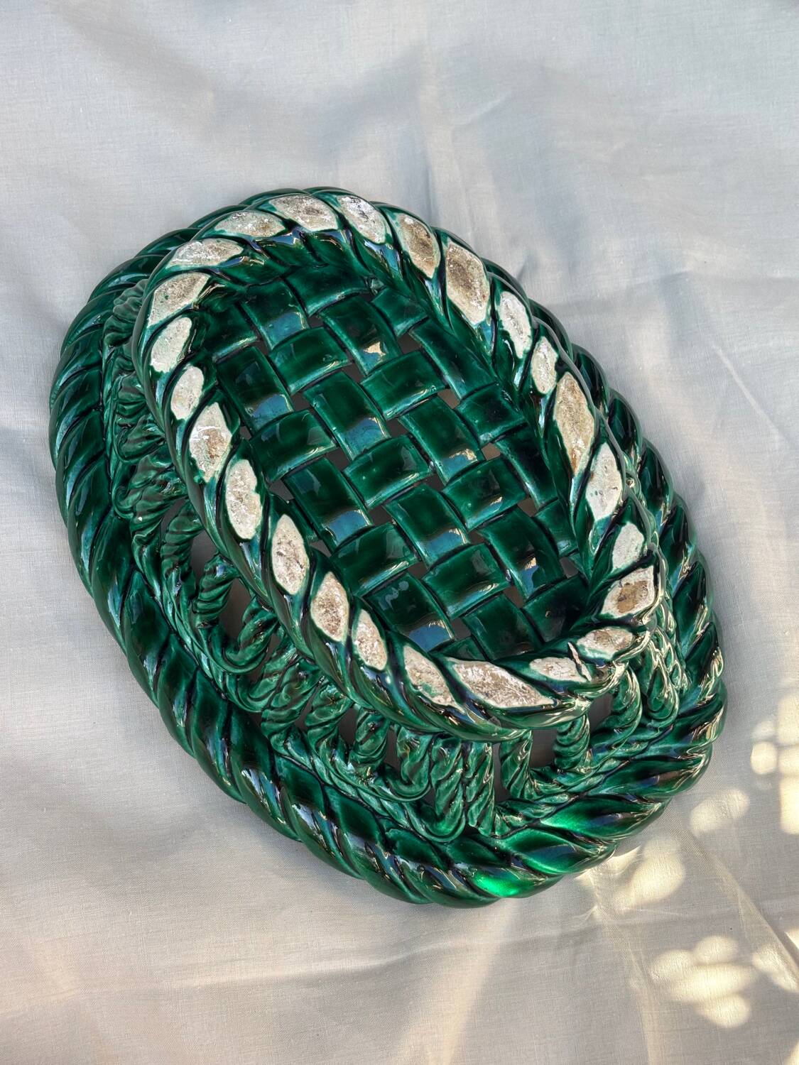 Green woven ceramic basket