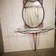 Wrought iron mirror and glass shelf