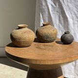 Natural solid mango side table (monoxyle) with conical legs.