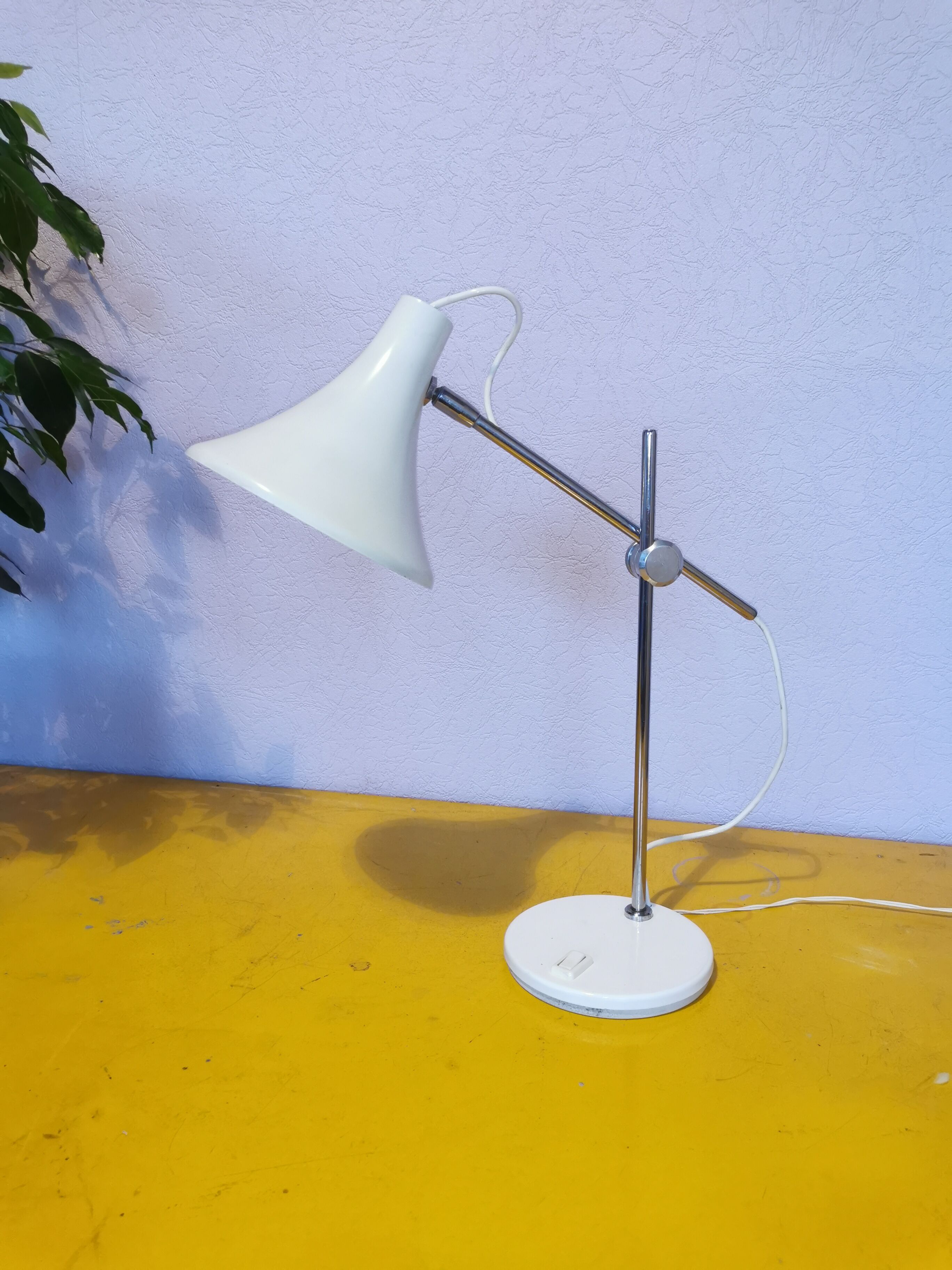 Articulated lamp in white lacquered steel and chrome, 1970.