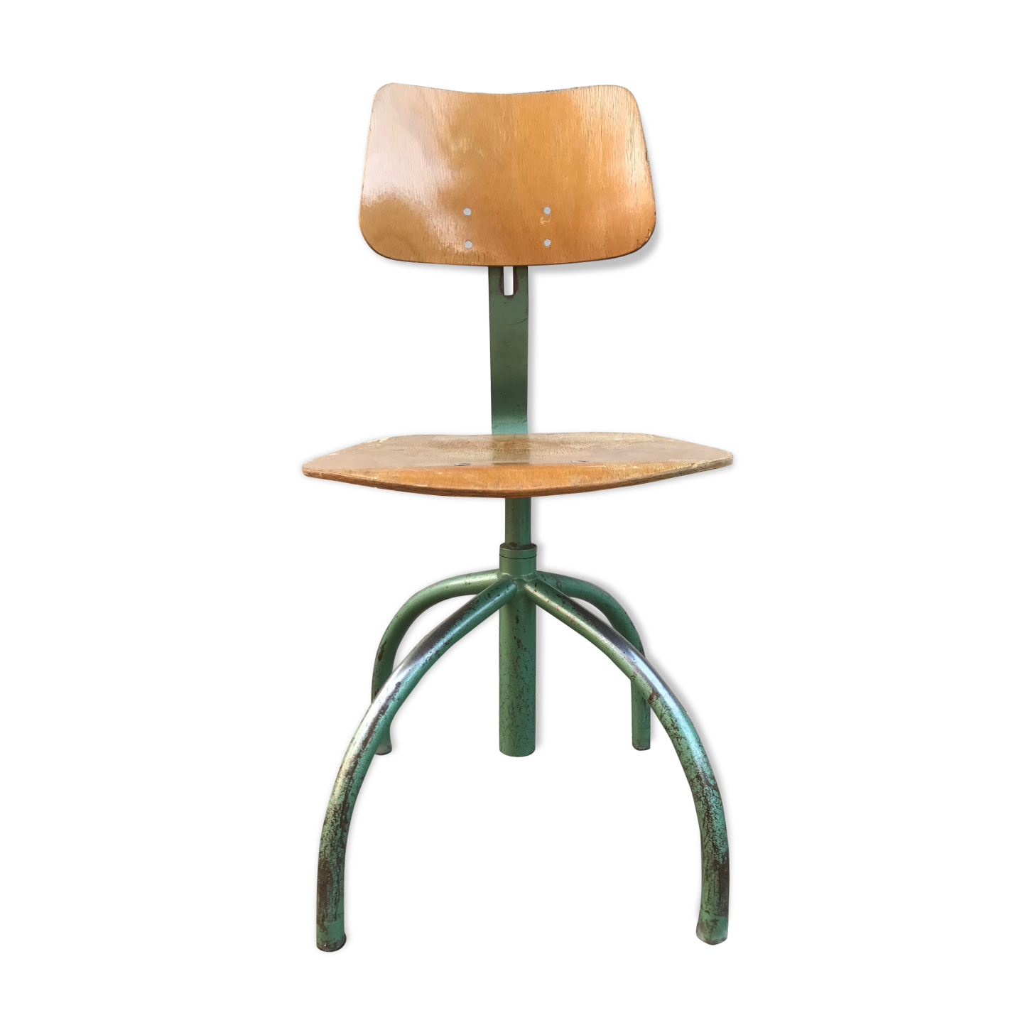 Former green metal workshop chair