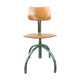 Former green metal workshop chair