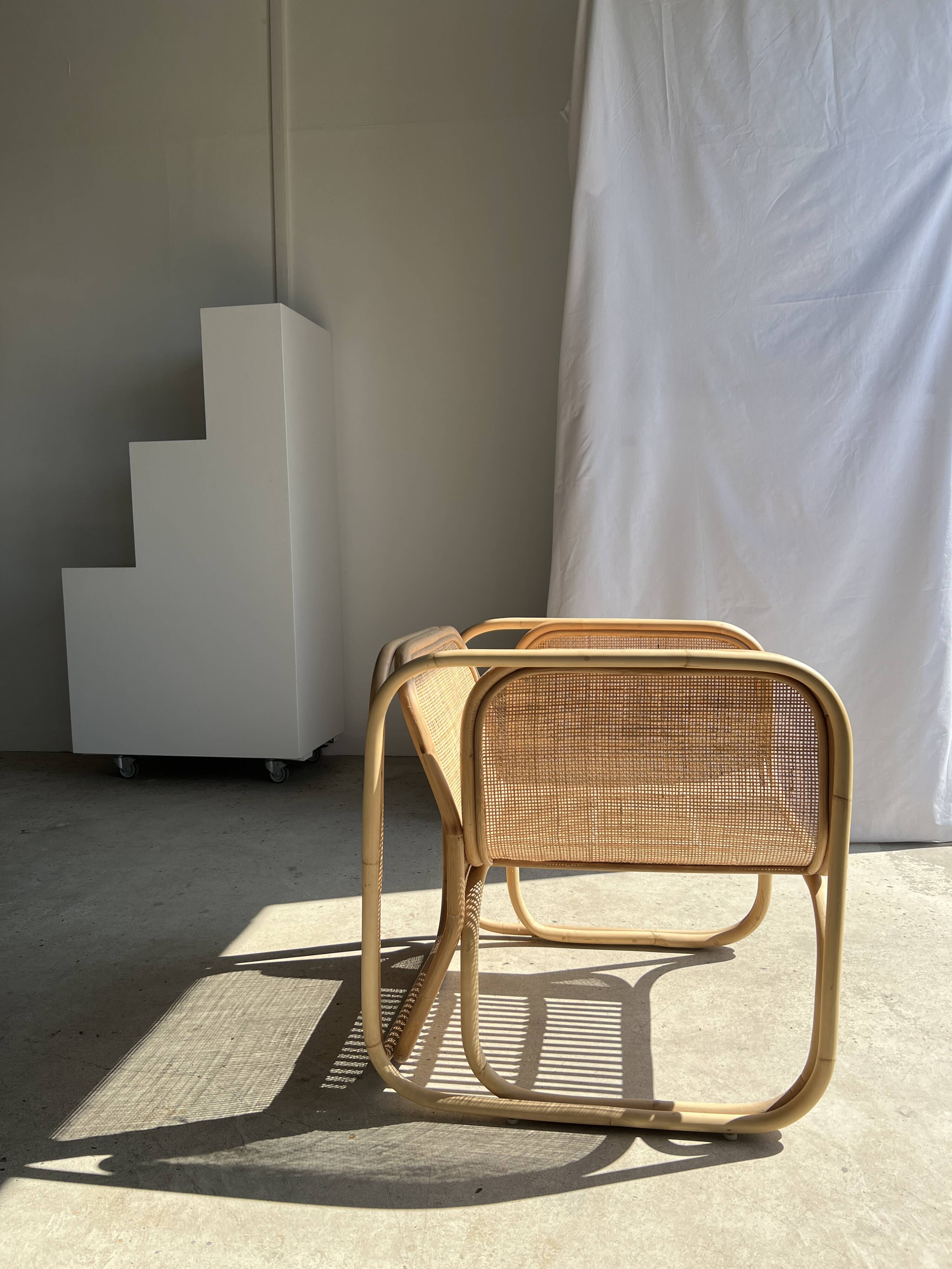 Amsterdam rattan armchair with U-shaped armrest, squared canework