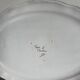 Large earthenware dish from Moustiers, signed Féret