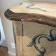 Serpentine commode, 18th century style, Italian, painted and gilded with patterns.