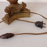 Empire period torch candle holder in bronze tripod base with lion's claws