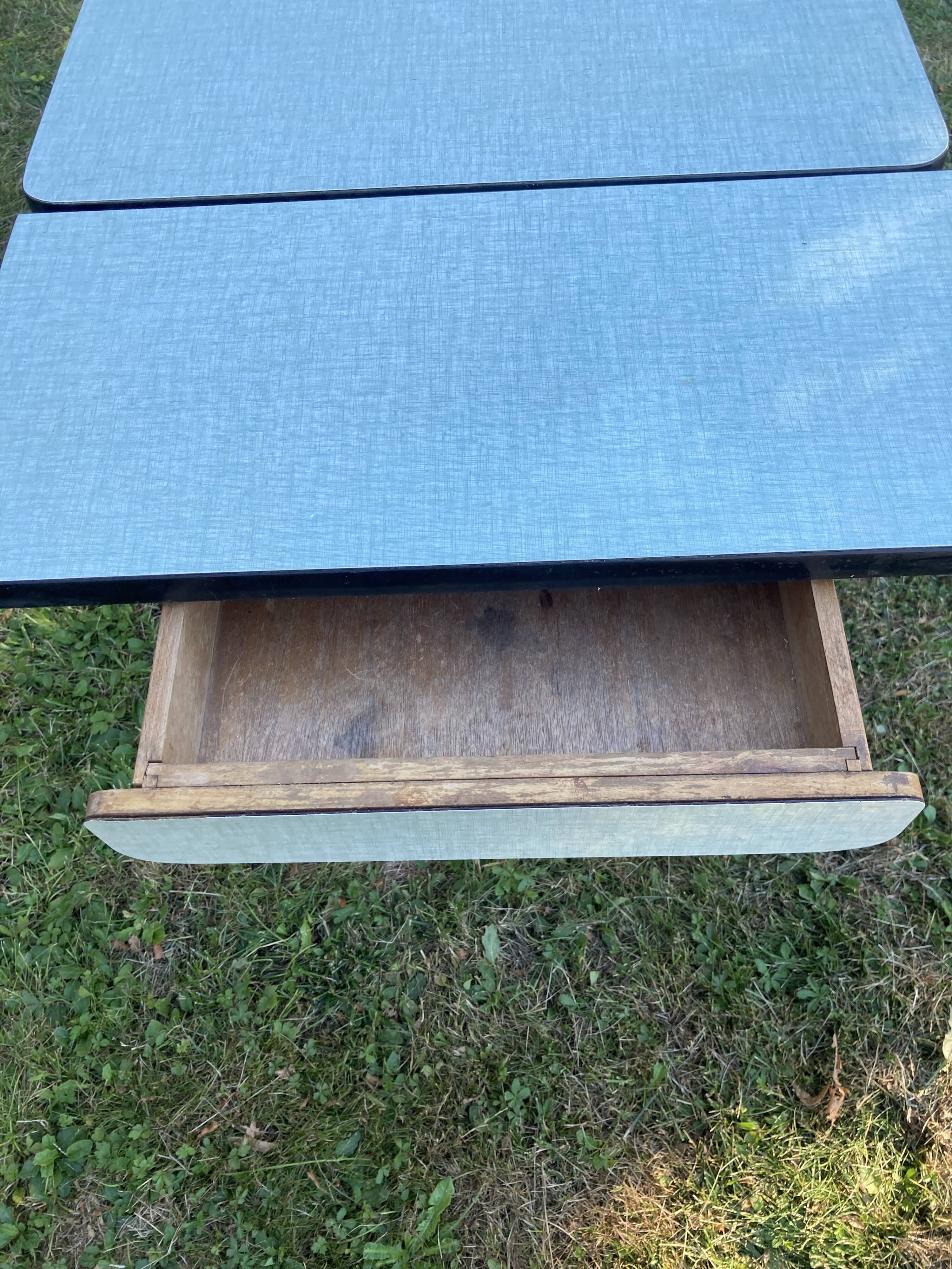 Blue formica table with extensions